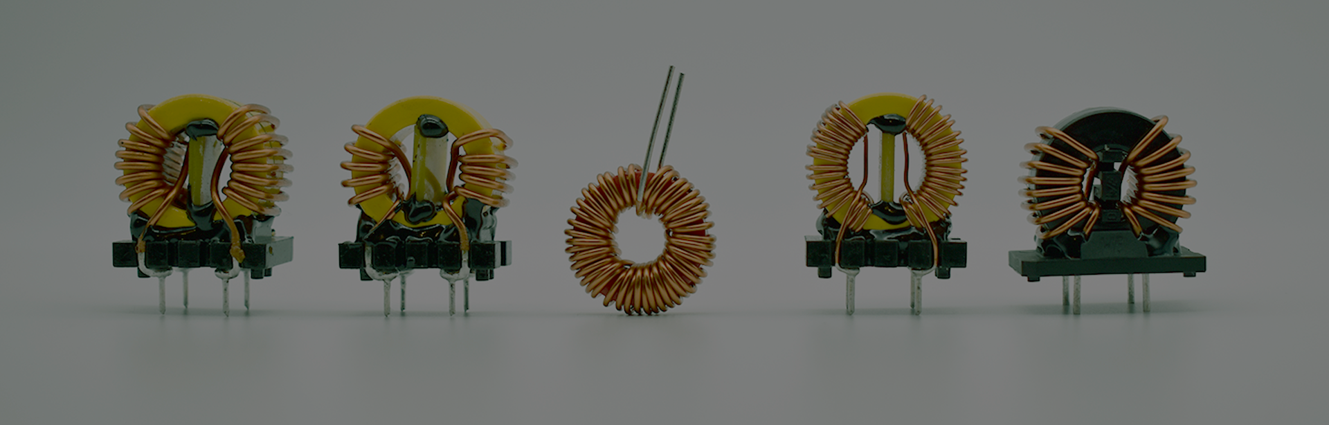 Common mode chokes that use an inductor cored with high permeable material